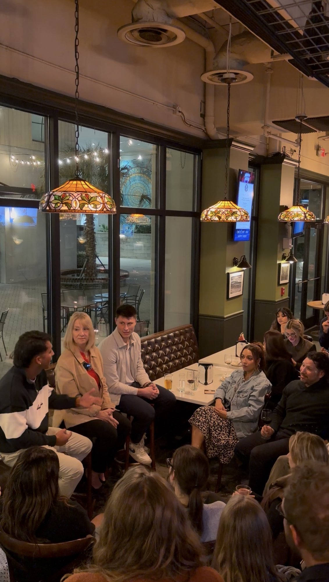 Dr. Stephanie Thomason on the panel at The Lecture Lounge with the audience seated around them